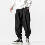 Men’s Relaxed Fit Pleated Joggers with Adjustable Elastic Waistband